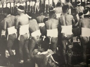 Tamotsu Yato, photographer. 1960s image of men participating in the ancient rite of Hadaka Matsuri (translation from Japanese: "Naked festival").